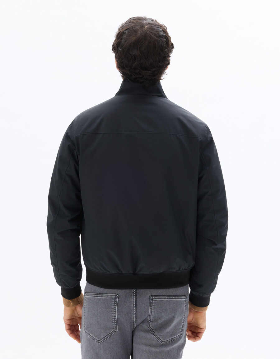 giacca nera drycore con collo alto