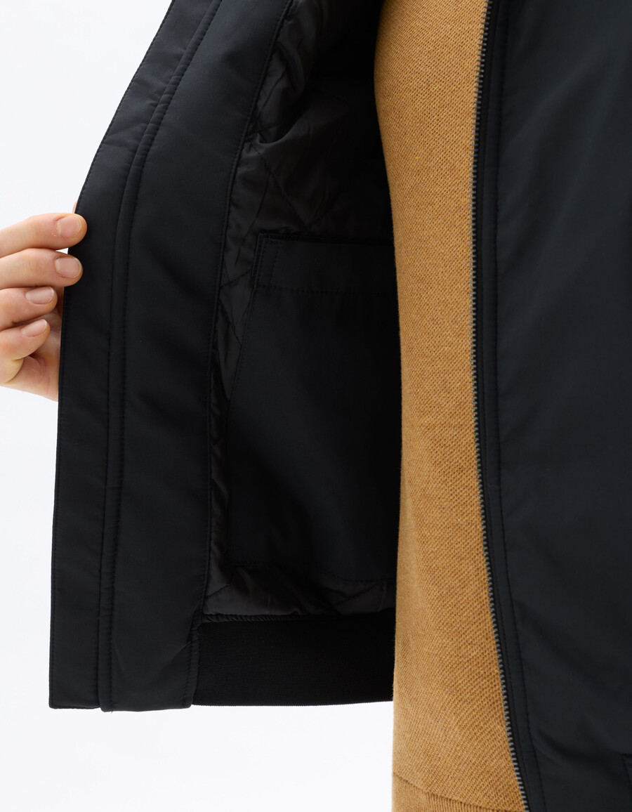 giacca nera drycore con collo alto