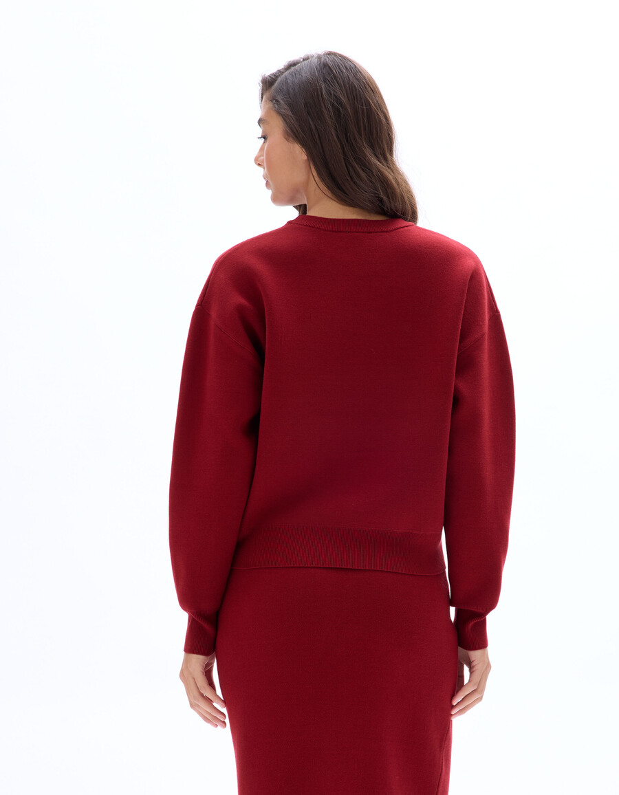 maglione compatto e squadrato